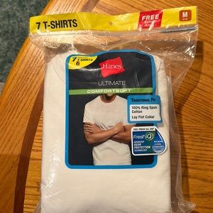 Men’s.  Hanes. 7 Tagless T shirts. White crew neck. Size M 38-40”. New